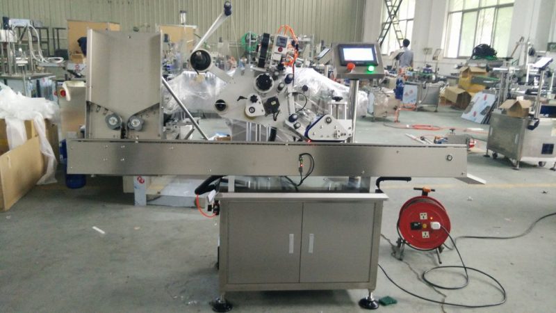 China High Speed kleine runde Dosen Etikettenklebstoffmaschine, Auge schwarz Flasche Etikettenaufkleber Maschine für Kosmetiklieferanten